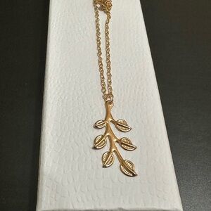 Gold tone leaf necklace. Bohemian. Brand new